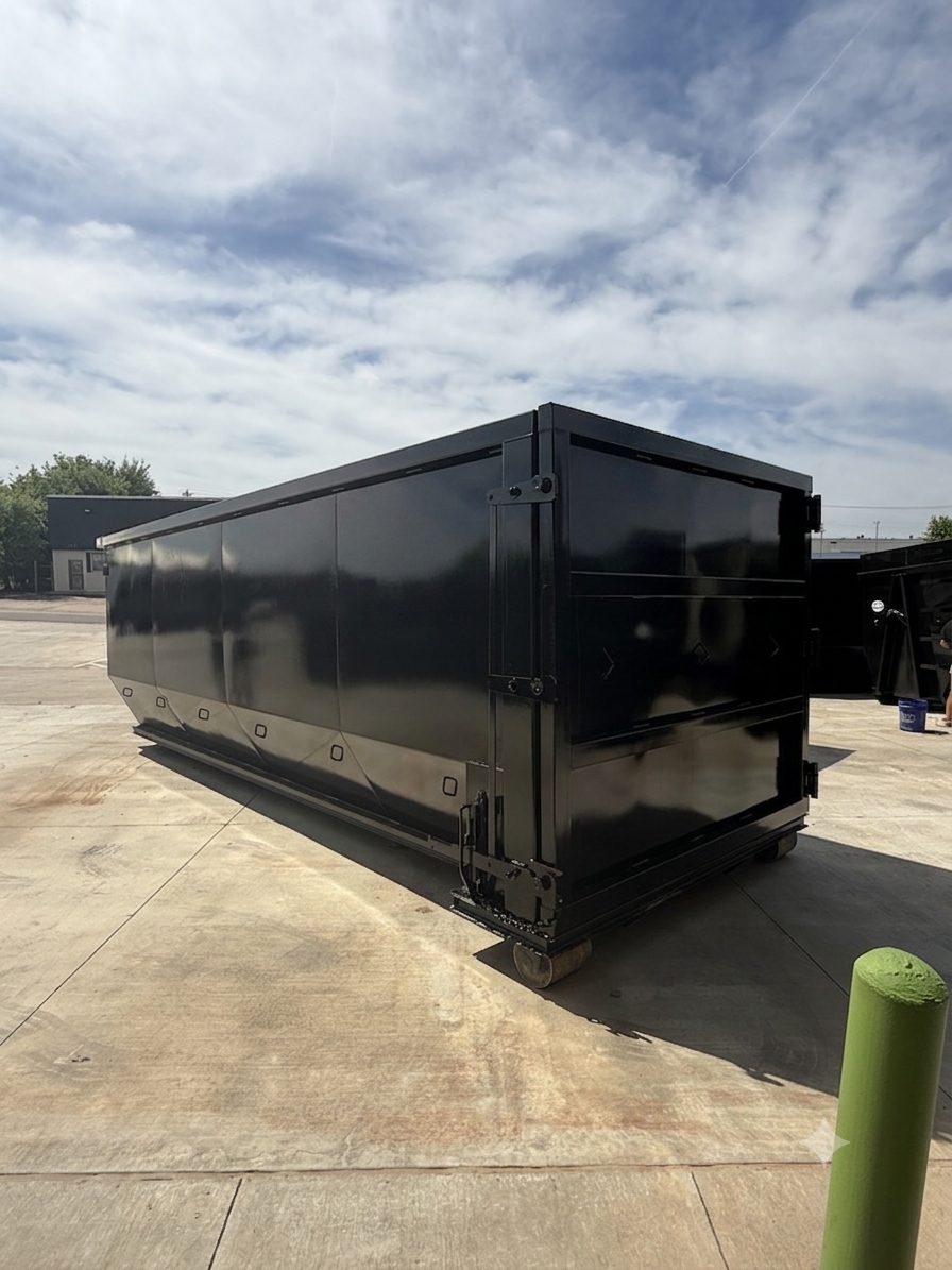 Black roll-off dumpster ready for delivery in Lawton, OK